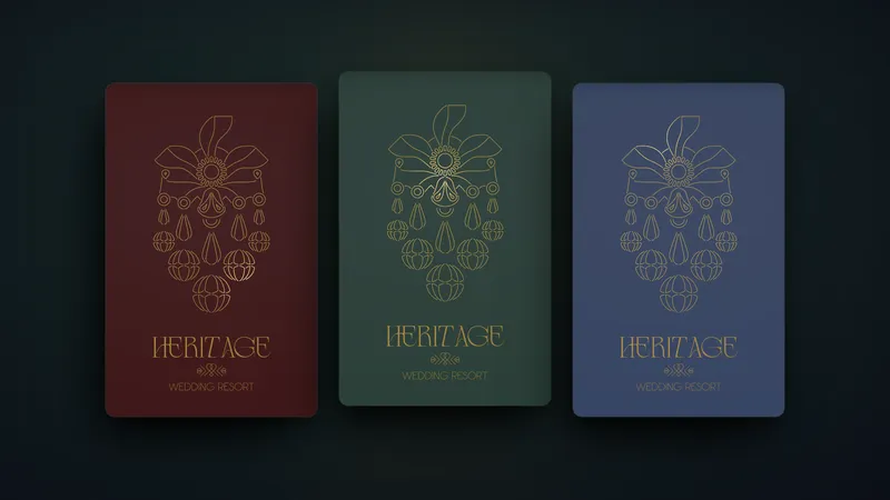 Three Heritage Wedding Resort cards in burgundy, green and blue colourways, each with the gold line-art emblem and the Heritage Wedding Resort wordmark.
